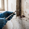 Residual spray treatment applied to wall cracks and crevices for cockroach control in Coimbatore